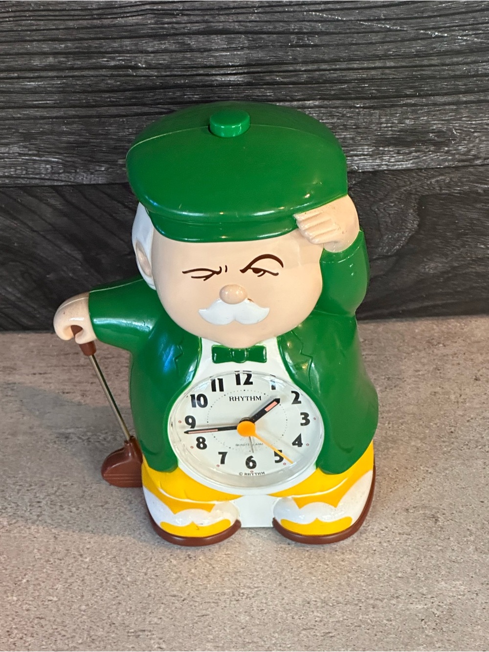 Rhythm Green and Yellow Golfer Novelty Wall Clock